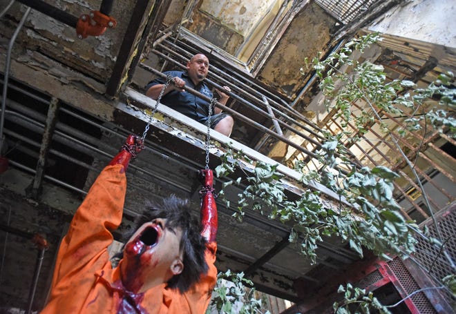 Vic Amesquita looks over Blood Prison at the Mansfield Reformatory. The popular Halloween attraction opens Saturday.