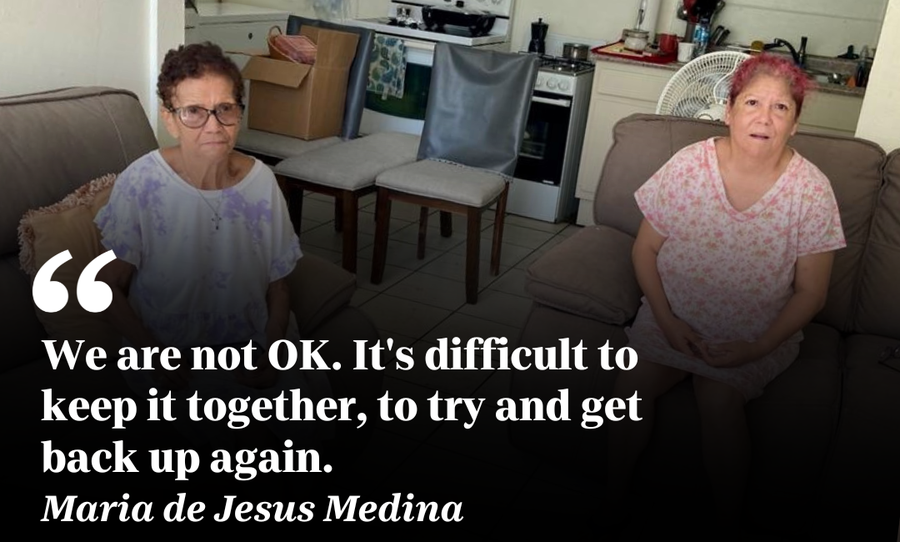 Maria de Jesus Medina, 83, sits with her daughter, Jesusa Vilches, 60, who is diabetic and hasn't had insulin in days after flooding damaged the refrigerator that stored her medication.