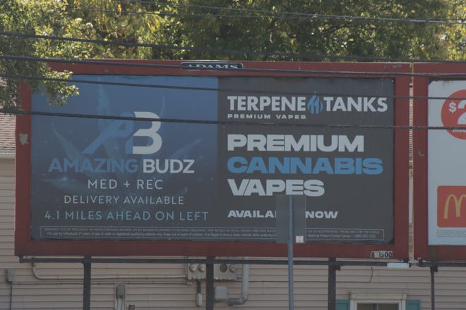 A billboard for marijuana business Amazing Budz is pictured Friday, Sept. 23, 2022, along M-52 in Adrian Township.
