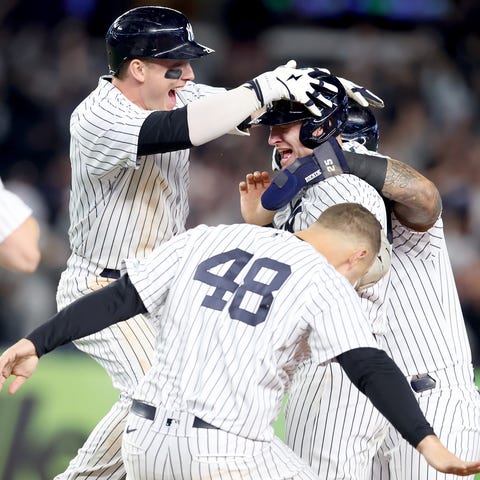 The New York Yankees mob Josh Donaldson following 
