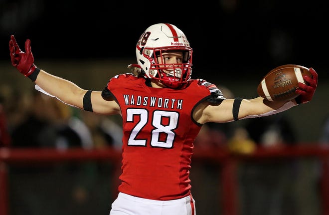 Wadsworth running back Kyle Figuray celebrates after scoring during the second half of a high school football game against the Nordonia Knights, Friday, Sept. 23, 2022, in Wadsworth, Ohio. [Jeff Lange/Beacon Journal]