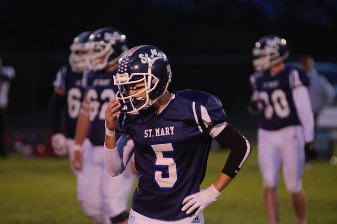 St. Mary's Sam Jacobson looks for the play from the sideline during a matchup between Gaylord St. Mary and Onaway on Friday, September 23.