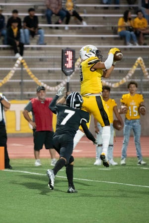 Pueblo East's Izaiah Trujillo hauls in a touchdown pass during the 47th annual Cannon Game against Pueblo South on Friday, Sept. 23, 2022. The game was called before halftime due to a fight on the South sideline, but Pueblo police said Monday they do not expect to press charges on any of the fight's participants.