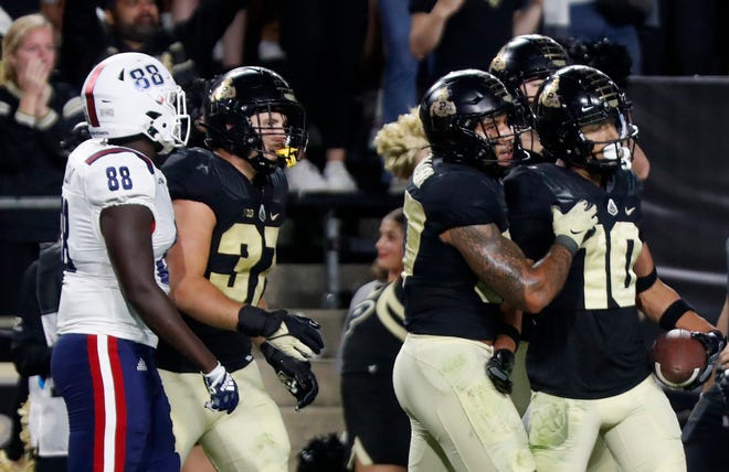 Purdue Boilermakers safety Cam Allen (10) celebrates after intercepting a pass during the NCAA football game against the Florida Atlantic Owls, Saturday, Sept. 24, 2022, at Ross-Ade Stadium in West Lafayette, Ind. Purdue won 28-26.