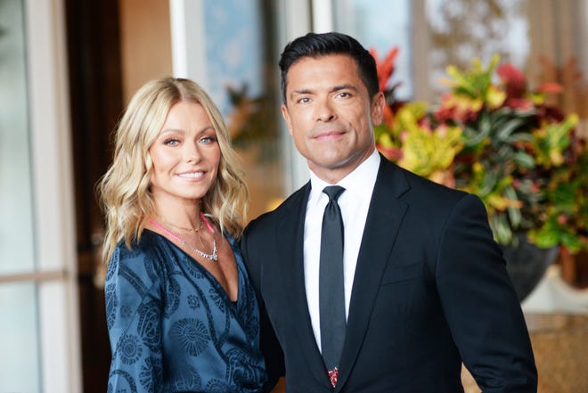 Kelly Ripa, left, and Mark Consuelos attend an event in Beverly Hills, California, in 2018. The actors met on the set of ABC soap "All My Children" and married in 1996.