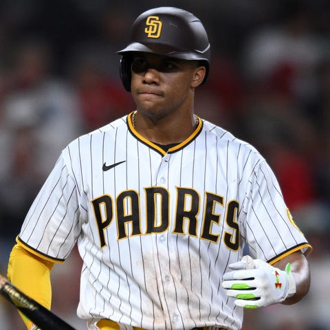 Juan Soto reacts after a walk against the Cardinal