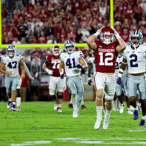 Oklahoma wide receiver Drake Stoops (12) reacts to