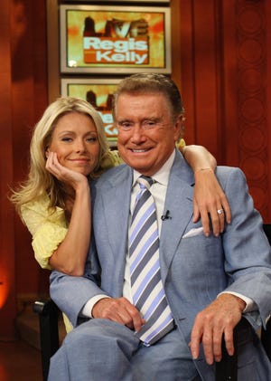 Kelly Ripa, left, and Regis Philbin on the New York set of "Live! with Regis and Kelly" in 2007. Philbin died in 2020 at age 88.