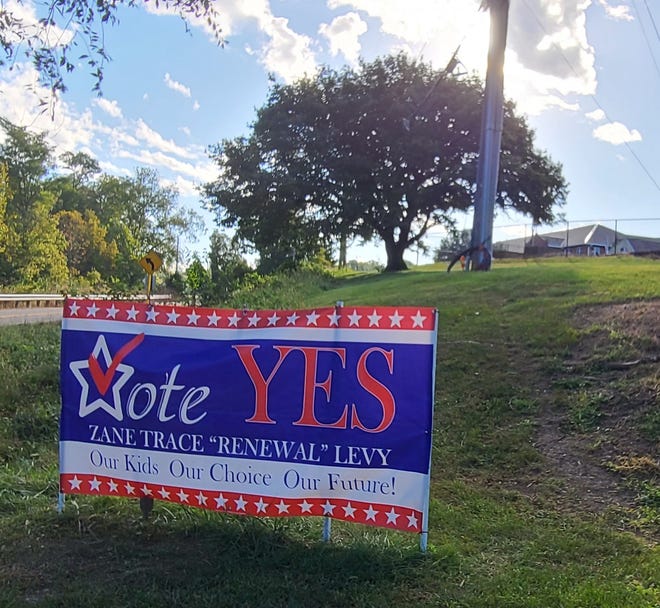 A banner in front of Zane Trace Schools encourages community members to support the school, and the kids, by voting yes to renew the Zane Trace levy that will be on the ballot this year.