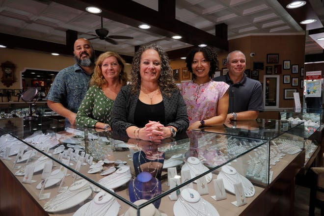 From left, Litton Polo, Diane Anderson, Alison Polo, Gabriella Cinelli and Michael Rosanio, members of the team at Zak's Jewelry in Cape Coral, pose for a portrait.