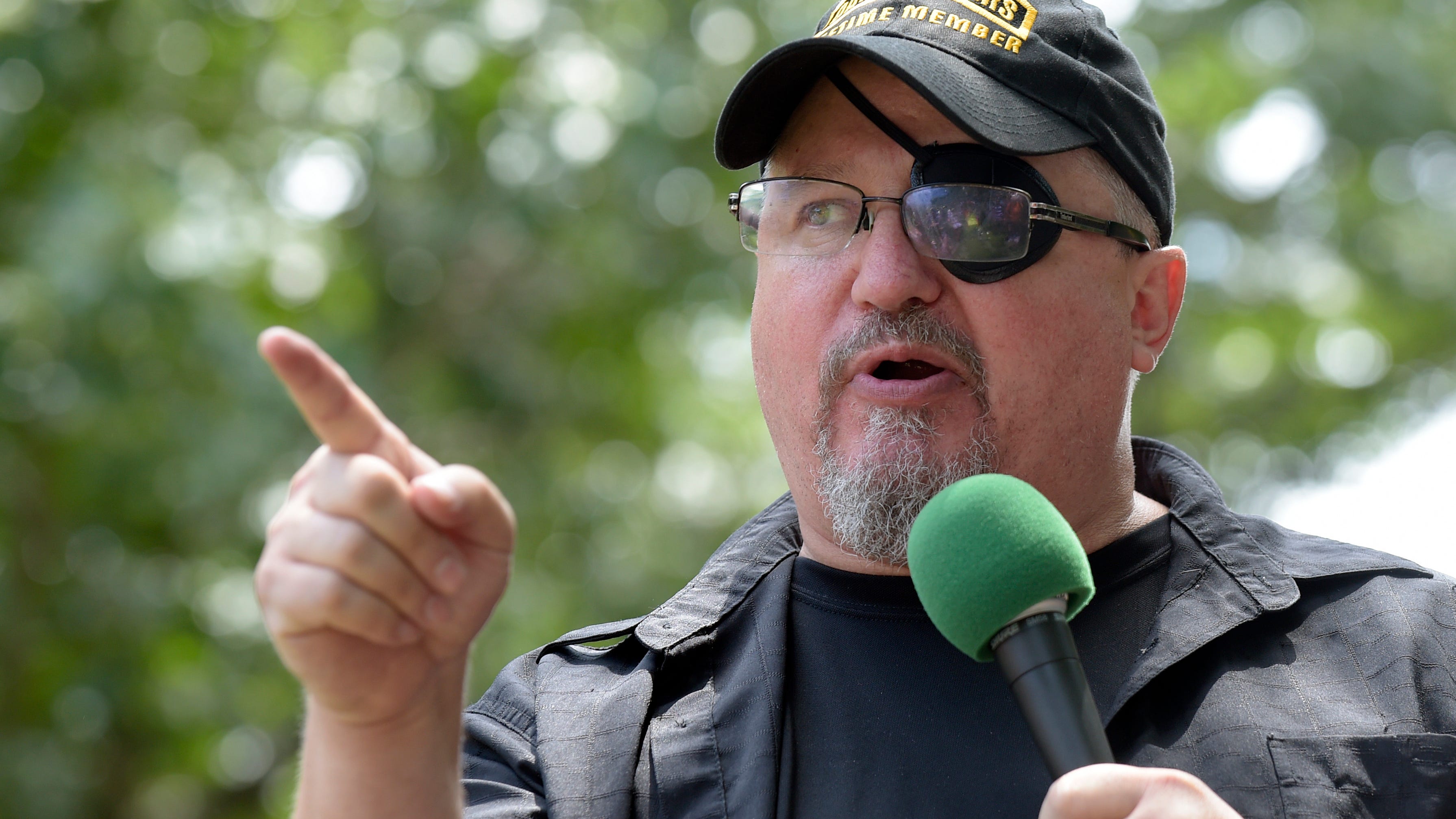 Stewart Rhodes, founder of the citizen militia group known as the Oath Keepers speaks during a rally outside the White House in Washington, on June 25, 2017. Rhodes formally launched the Oath Keepers in Lexington, Massachusetts, on April 19, 2009, where the first shot in the American Revolution was fired. (AP Photo/Susan Walsh, File)