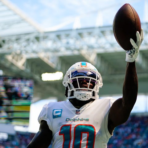 Dolphins wide receiver Tyreek Hill celebrates afte
