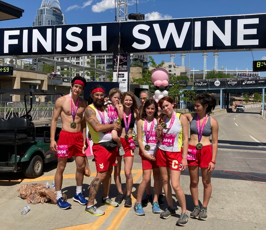 The Crawford family poses at the finish line of the Flying Pig Marathon in Cincinnati.