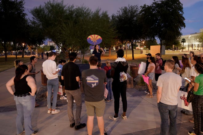 Protesters gather outside the Capitol to voice their dissent with an abortion ruling, Friday, Sept. 23, 2022, in Phoenix. An Arizona judge ruled the state can enforce a near-total ban on abortions that has been blocked for nearly 50 years. The law was first enacted decades before Arizona became a state in 1912.