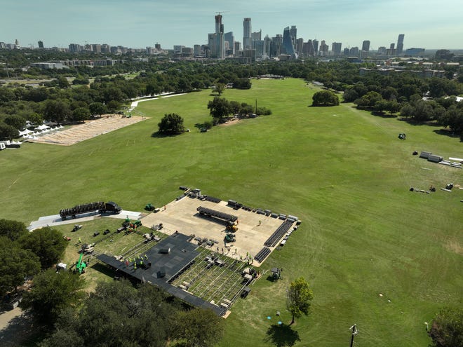 Crews build a stage in Zilker Park on Tuesday for the Austin City Limits Music Festival. The park's Great Lawn closed Monday and will remain closed to the public until after the cleanup for the annual music fest.