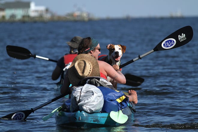 Pamlico-Tar Riverkeeper Jill Howell, seen with her dog, Miller, will join Neuse River Waterkeeper Samantha Krop on the Neuse River Rising paddle, an 11-day, 150-mile trip down the river from Smithfield to New Bern.