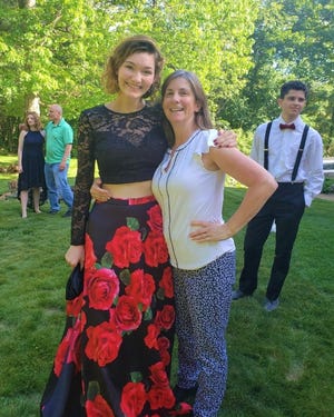 Rosie Lohman-Mitchell and Lisa Call are seen the day of Rosie's senior prom in May 2021, two days before Rosie collapsed.