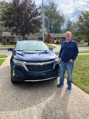 Bruce Gorman of Livonia is happy with his 2022 Chevy Equinox but had to wait three months to get it because of production delays resulting from the global semiconductor shortage.