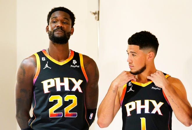 Phoenix Suns' Deandre Ayton and Devin Booker moments before being photographed at media day in Phoenix on Sept. 26, 2022.