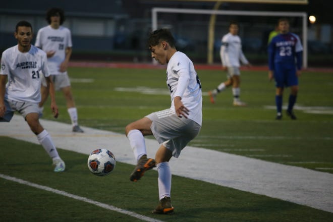 Marysville's George Telegadas gains possession of the ball during a game earlier this season. The senior scored two goals in the Vikings' 4-1 win over St. Clair Shores Lake Shore on Monday.