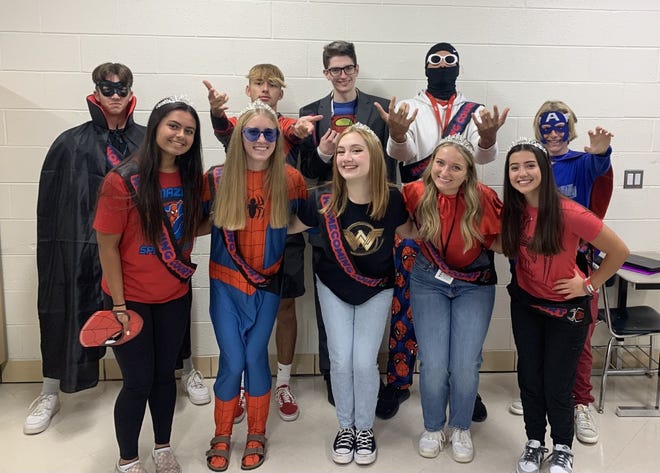 The Huron High School homecoming court dressed up for superhero day Wednesday.