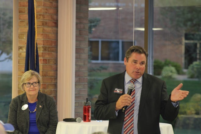 Competitors for the 37th State Senate seat Barb Conley (left) and John Damoose (right) spoke to the audience of over 80 area residents at the candidate forum hosted by the Petoskey and Charlevoix chambers of commerce at North Central Michigan College on Monday, Sept. 26.