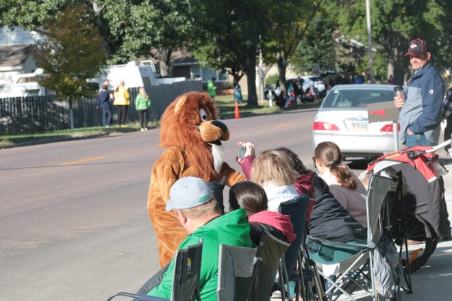The Langford Lion mascot marched behind the marching band and interacted with those watching Wednesday's Roncalli Parade of Bands in Aberdeen. The Langford marching band took home fourth place in the Parade of Bands.