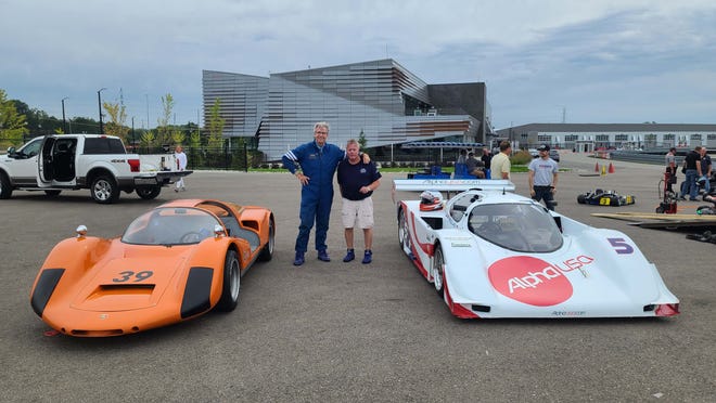 From left, Henry Payne with his 1966 Porsche 906E and Dave Nikolas with his 1988 Fabcar V-8 at M-1 Concourse for the speed festival test day.