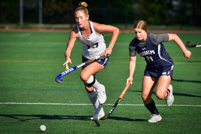 Anna Stock, #11 of Randolph and Maddie Engelkraut, #13 of Chatham chase for the loose ball in the first half during the NJAC-American field hockey in Chatham, Tuesday on 09/27/22. 