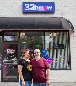 Frank and Alia Angel stand in front of their new gelato shop and bakery, 32 Below, during their grand opening earlier this month on Lewis Avenue in Temperance.