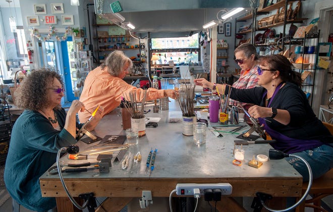 Participants in a recent class on glassmaking at Elsie Kaye Glassworks in Westborough include, from left, artist-in-residence and educator Sheila Chikwai of Natick; Nancy Park of Lancaster; Surrey Bitex by Auburn; and owner Holly Kenny, September 29, 2022.