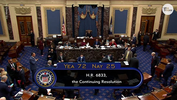 The Senate voted to pass a stopgap bill to avert a