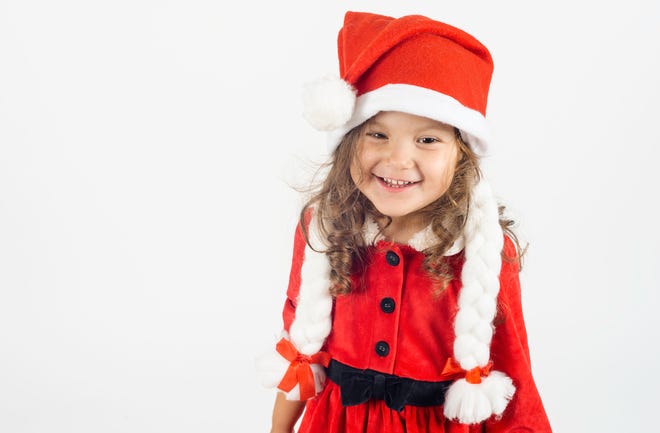 Girl in Santa Claus costume