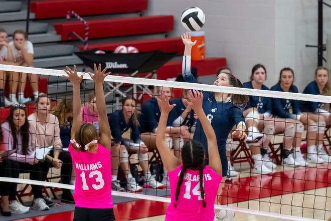 Central Catholic senior Caroline Beardmore (8) lines up a shot in the Central Catholic Knights at West Lafayette Red Devils volleyball game, Wednesday Sep. 28, 2022 in West Lafayette.