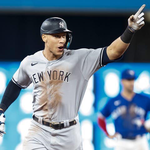 Aaron Judge celebrates as he rounds the bases afte