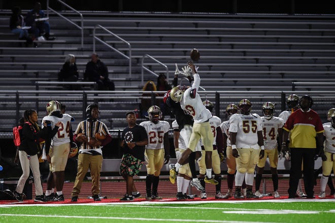 Cross Creek wide receiver Jayden Dunn (19) reaches for a pass during the Harlem and Cross Creek football game at Harlem High School on Thursday, Sept. 29, 2022. The game was moved due to Hurricane Ian, which is due to hit Augusta on Friday morning. Harlem defeated Cross Creek 54-12. 