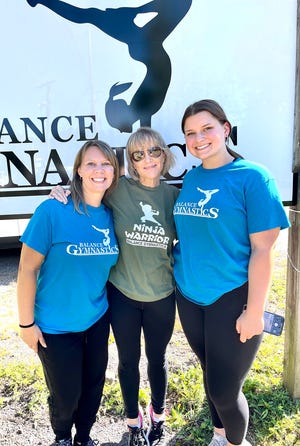 Balance Gymnastics & Wellness Center hosted a gala Open House this past weekend. The event allowed hundreds of local folks to explore the organization's brand new 10,000 square foot facility in White Mills. Pictured here is founder and owner Katie Firmstone (center) along with Tracy Parenti (left) and Ashley Atcavage (right).