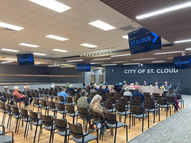 Residents file in to watch the St. Cloud City Council candidate forum on Sept. 29, 2022 at City Hall, hosted by the League of Minnesota Women Voters.