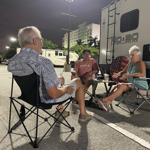 Hurricane evacuees gather outside the Miccosukee R