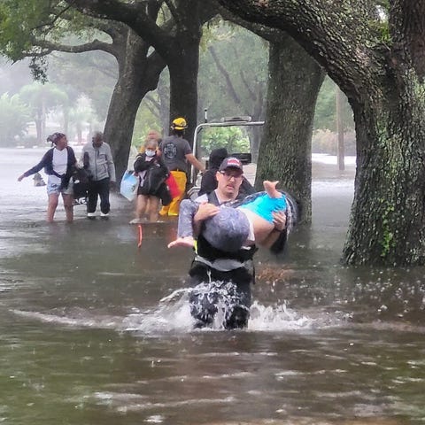 Even as Hurricane Ian's rain continued falling, fi