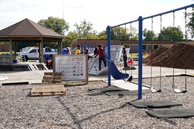 Features of the barrier-free playground at Alexander Elementary School in Adrian include sensory items, swings with back support, a merry-go-round where those who use a wheelchair can be strapped in, wheelchair ramps and a firm, rubberized surface.