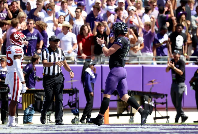 Oct 1, 2022; Fort Worth, Texas, USA;  TCU Horned Frogs quarterback Max Duggan (15) reacts after throwing a touchdown pass during the first half against the Oklahoma Sooners at Amon G. Carter Stadium. Mandatory Credit: Kevin Jairaj-USA TODAY Sports