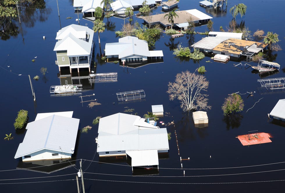 Homes east of North Port, Fla., are flooded by rising water from the Peace River following Hurricane Ian on Friday, September 30, 2022.