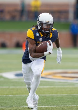 Kent State wide receiver Dante Cephas sprints up field after making a catch during last Saturday's victory over Ohio University at Dix Stadium.