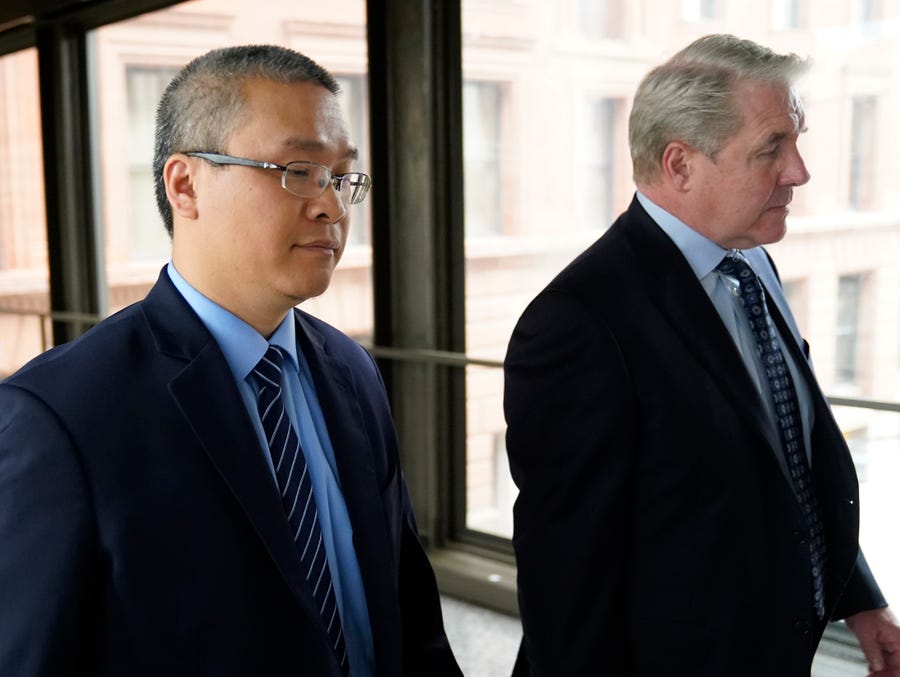 Former Minneapolis police officer Tou Thao, left, and his attorney Robert Paule arrive for sentencing for violating George Floyd's civil rights outside the Federal Courthouse Wednesday, July 27, 2022, in St. Paul, Minn. A judge has scheduled a hearing for Monday, Aug. 15, 2022, on the status of plea negotiations in the case of the two remaining officers awaiting trial on state charges in the murder of George Floyd. Thao and J. Alexander Kueng face a late October trial.