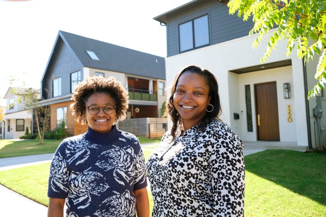 Sisters Erica Emery, left, and Monique Short are among a new wave of business people and civic influencers giving their time and energy to shape Oklahoma City's future. The homebuilders are shown in front of two houses they built on NE 8.
