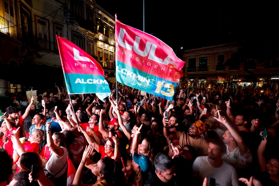 Supporters of former President of Brazil and Candidate for the Worker's Party (PT) Luiz Inacio Lula da Silva shout slogans at the end of the general election day at Largo da Prainha on October 02, 2022 in Rio de Janeiro, Brazil.