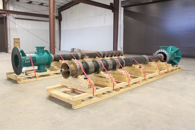 These vertical turbine pumps manufactured by SIMFLO, seen at the company's new test facility on Tuesday, are soon destined for Indonesia.