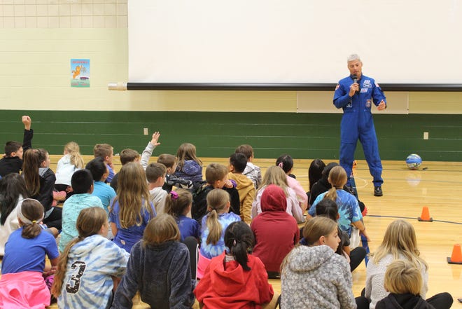NASA astronaut Mark Vande Hei speaks to students at McAuliffe Elementary School in Bellevue on Monday.