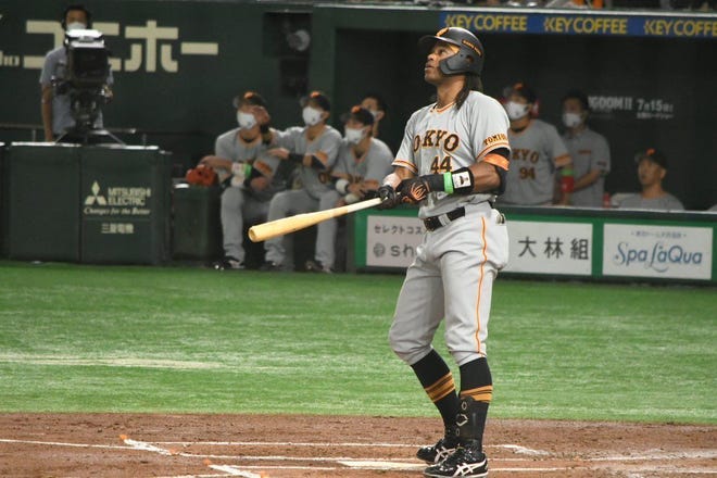 Adam Walker watches the ball after an at bat. Walker, a Milwaukee native and former Milkmen star, is playing his first season in Tokyo.